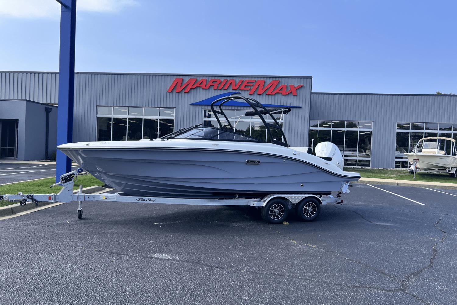 Sea Ray SPX 210 Outboard 2025 Sea Ray SPX 210 Outboard boat on trailer at MarineMax dealership.