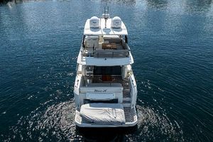 Prestige 520 Fly 2022 Prestige 520 Fly yacht on calm water, rear view.