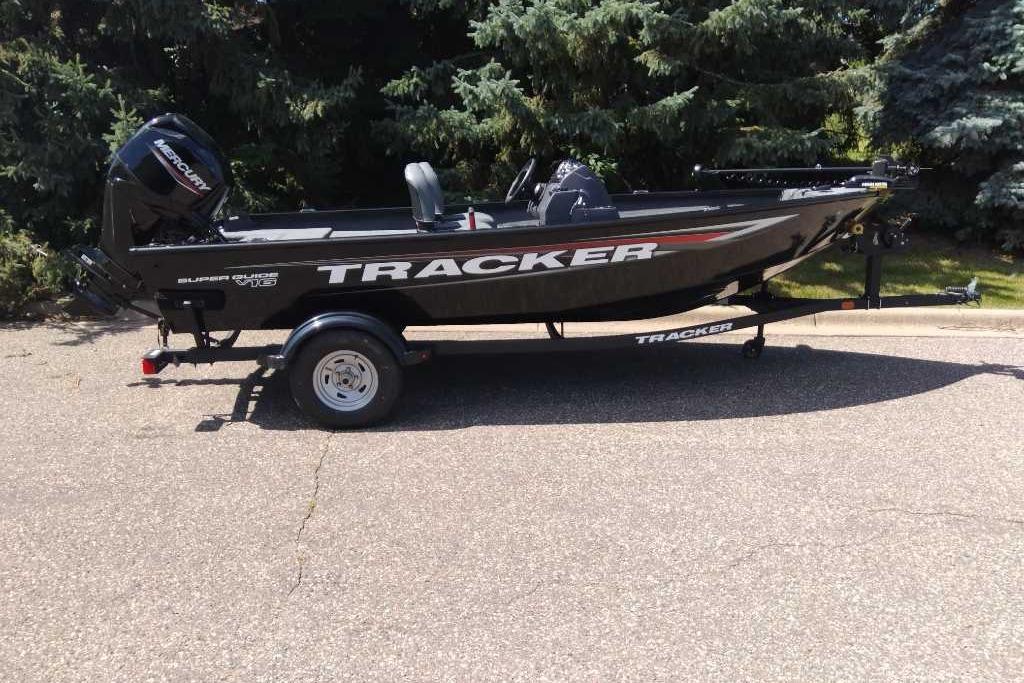 Tracker Super Guide V-16 SC 2026 Tracker Super Guide V-16 SC boat on trailer, parked outdoors.