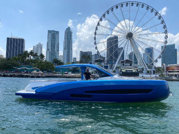 Nassima Yacht N40 Nassima Yacht N40 2025 cruising near city skyline and Ferris wheel.