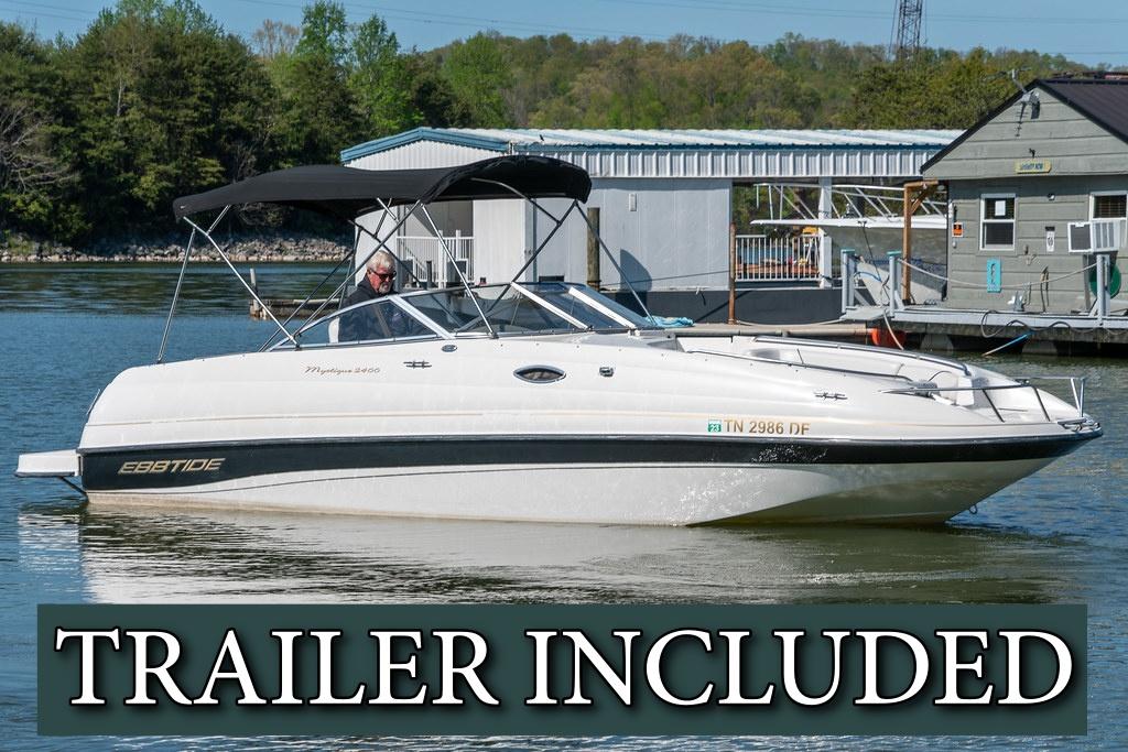 Ebbtide 2400 Mystique Fun Cruiser 2002 Ebbtide 2400 Mystique Fun Cruiser boat on water, trailer included.