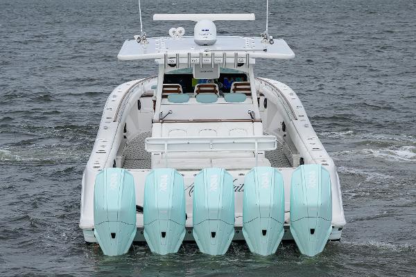 HCB 53 Sueños 2021 HCB 53 Sueños boat with five outboard engines on the water.