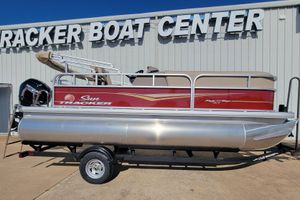 Sun Tracker Party Barge 18 DLX 2025 Sun Tracker Party Barge 18 DLX pontoon boat at dealership.