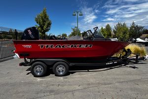 Tracker Targa V-18 Combo 2026 Tracker Targa V-18 Combo boat on trailer, parked outdoors under clear sky.