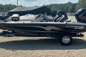 Nitro Z18 Pro 2026 Nitro Z18 Pro boat on trailer, parked outdoors under clear sky.