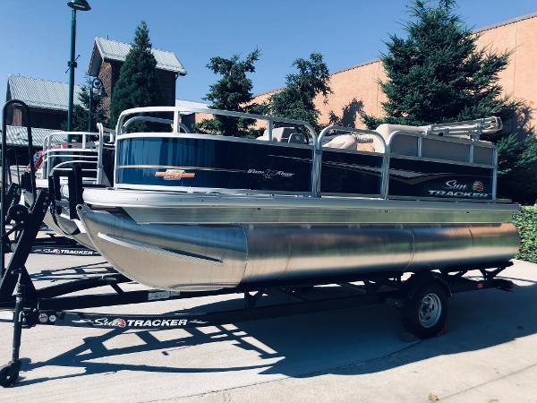 Sun Tracker Bass Buggy 16 XL Select 2023 Sun Tracker Bass Buggy 16 XL Select pontoon boat on trailer.