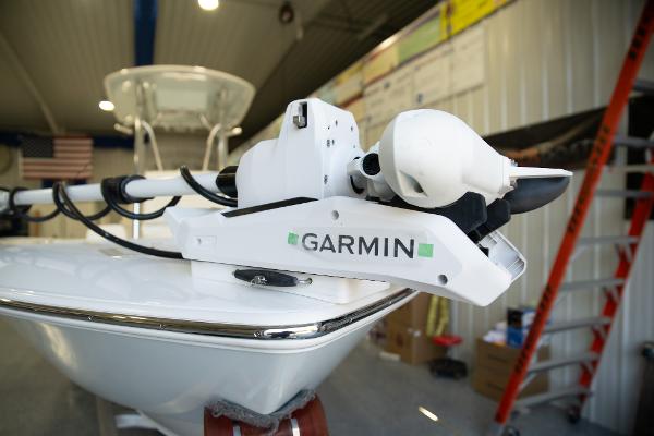 Contender 26 Bay Garmin equipment on 2025 Contender 26 Bay boat in a workshop setting.