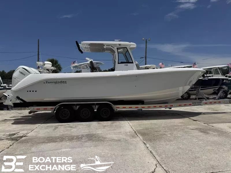 Everglades 315 CC 2026 Everglades 315 CC boat on trailer at Boaters Exchange dealership.