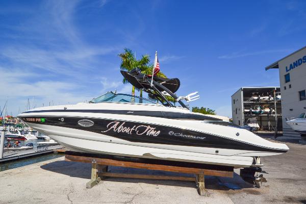 Crownline Eclipse E6 2014 Crownline Eclipse E6 boat on a dock with blue sky background.