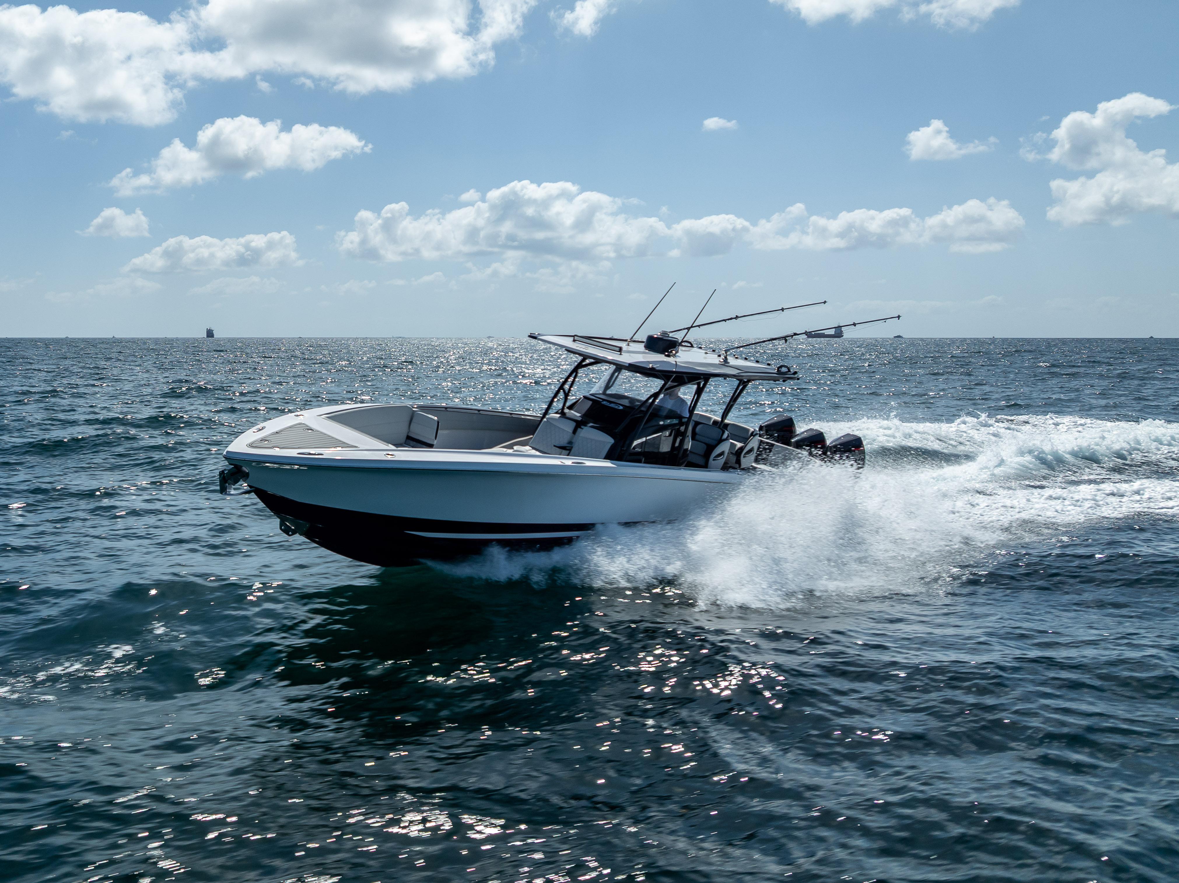 Nor-Tech 390 Sport Center Console 2022 Nor-Tech 390 Sport Center Console cruising on open water under a cloudy sky.