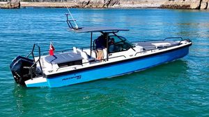 Axopar 28 T-Top 2020 Axopar 28 T-Top boat on clear blue water, featuring sleek design and modern amenities.