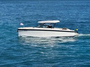 Delta Powerboats 26 2024 Delta Powerboats 26 cruising on clear blue water.