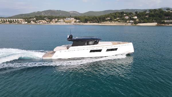 Pardo Yachts GT52 2023 Pardo Yachts GT 52 cruising on a scenic coastal waterway.