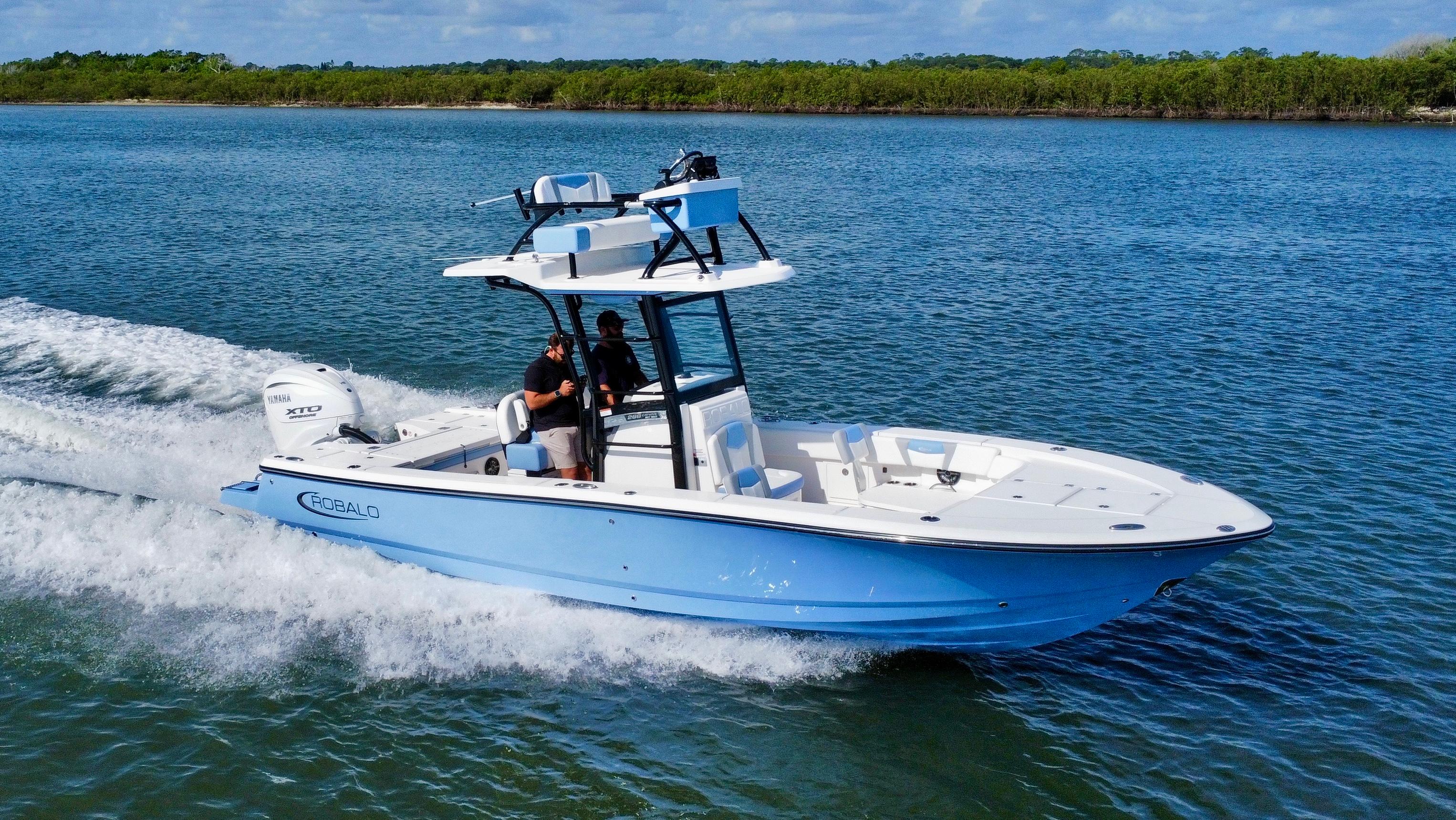 Robalo 266 Cayman SD 2025 Robalo 266 Cayman SD boat cruising on blue water.