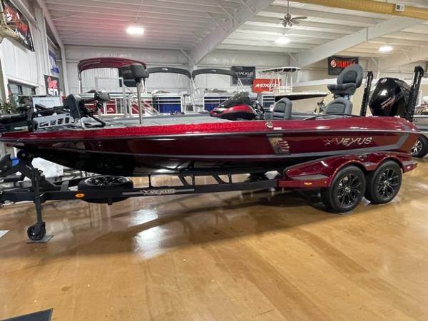 Vexus VX20 2023 Vexus VX20 bass boat in showroom, red color, on trailer.