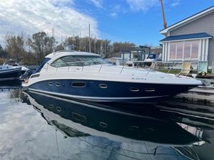 Sea Ray 43 Sundancer 2009 Sea Ray 43 Sundancer yacht docked at marina.