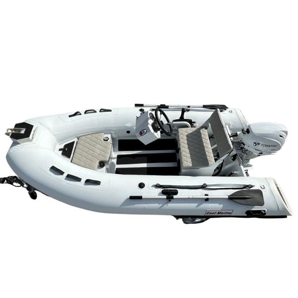 East Marine Godiac 320 Ultra-light 2024 EastMarine Godiac 320 Ultra-light inflatable boat, white with seating and steering console.