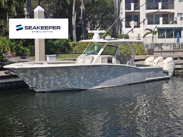 Scout 355 LXF 2024 Scout 355 LXF boat docked with Seakeeper stabilization system.