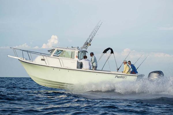 Parker 2820 XLD Sport Cabin Manufacturer Provided Image: 2023 Parker 2820 XLD Sport Cabin boat cruising on the ocean with passengers.
