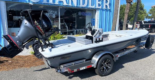 Maverick 17 HPX-V 2024 Maverick 17 HPX-V boat on a trailer outside a dealership.