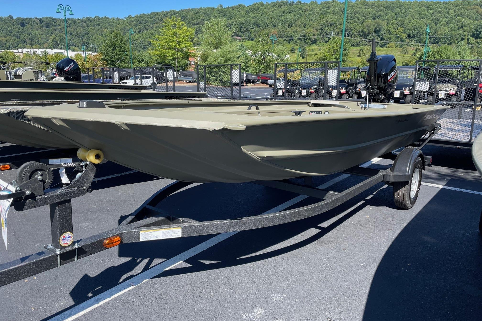 Tracker Grizzly 1654 T Sportsman 2026 Tracker Grizzly 1654 T Sportsman boat on trailer in outdoor setting.