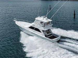 Viking 54 Convertible 2009 Viking 54 Convertible yacht cruising on open water.