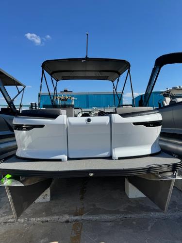 Manitou 22' Cruise Bench Twin Tube 2025 Manitou 22' Cruise Bench Twin Tube pontoon boat, docked under clear blue sky.