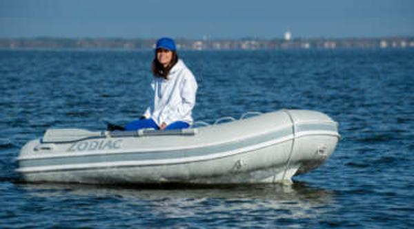 Zodiac Nomad RIB ALU 3.1 NEO 2024 Zodiac Nomad RIB ALU 3.1 NEO inflatable boat on water with person onboard.