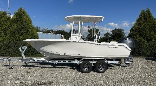 Tidewater 210 LXF 2024 Tidewater 210 LXF boat on a trailer, side view, outdoors.
