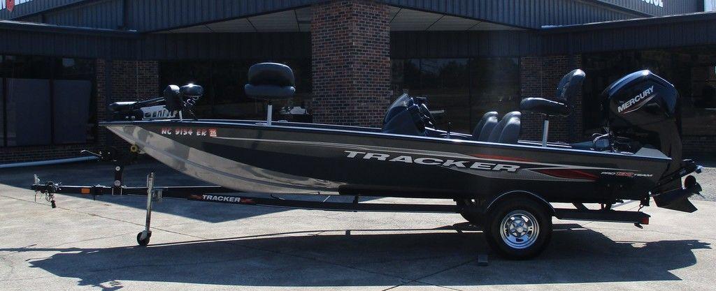 Tracker Pro Team 190 TX 2021 Tracker Pro Team™ 190 TX fishing boat on trailer, parked outdoors.