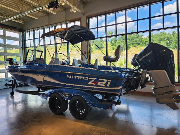 Nitro ZV21 2024 Nitro ZV21 boat with Mercury outboard motor in showroom.