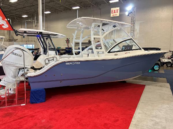 Sea Fox 268 Traveler 2025 Sea Fox 268 Traveler boat displayed indoors on red carpet.