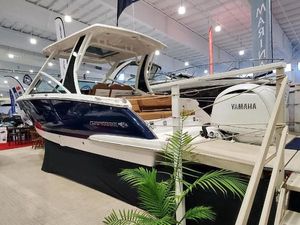 Chaparral 280 OSX 2025 Chaparral 280 OSX boat displayed indoors with Yamaha engine.