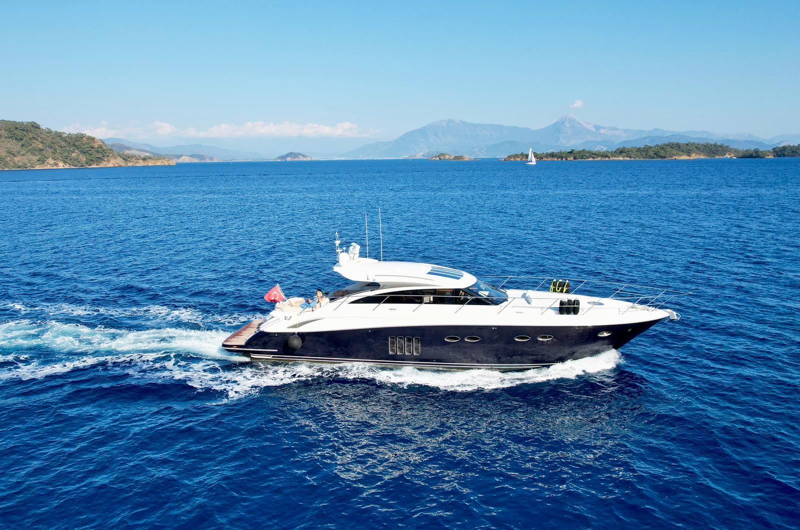 Princess V62 Luxury Princess V62 yacht cruising on blue ocean waters, 2010 model.