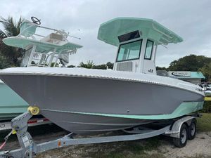Wellcraft 223 Fisherman 2025 Wellcraft 223 Fisherman boat on trailer, featuring sleek design and modern amenities.