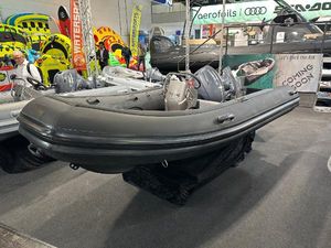 Pischel Ribline 3.8 Alu HD Compact 2025 Pischel Ribline 3.8 Alu HD Compact inflatable boat displayed at a marine exhibition.