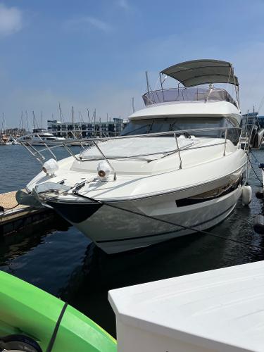 Prestige 460 2019 Prestige 460 yacht docked at marina.