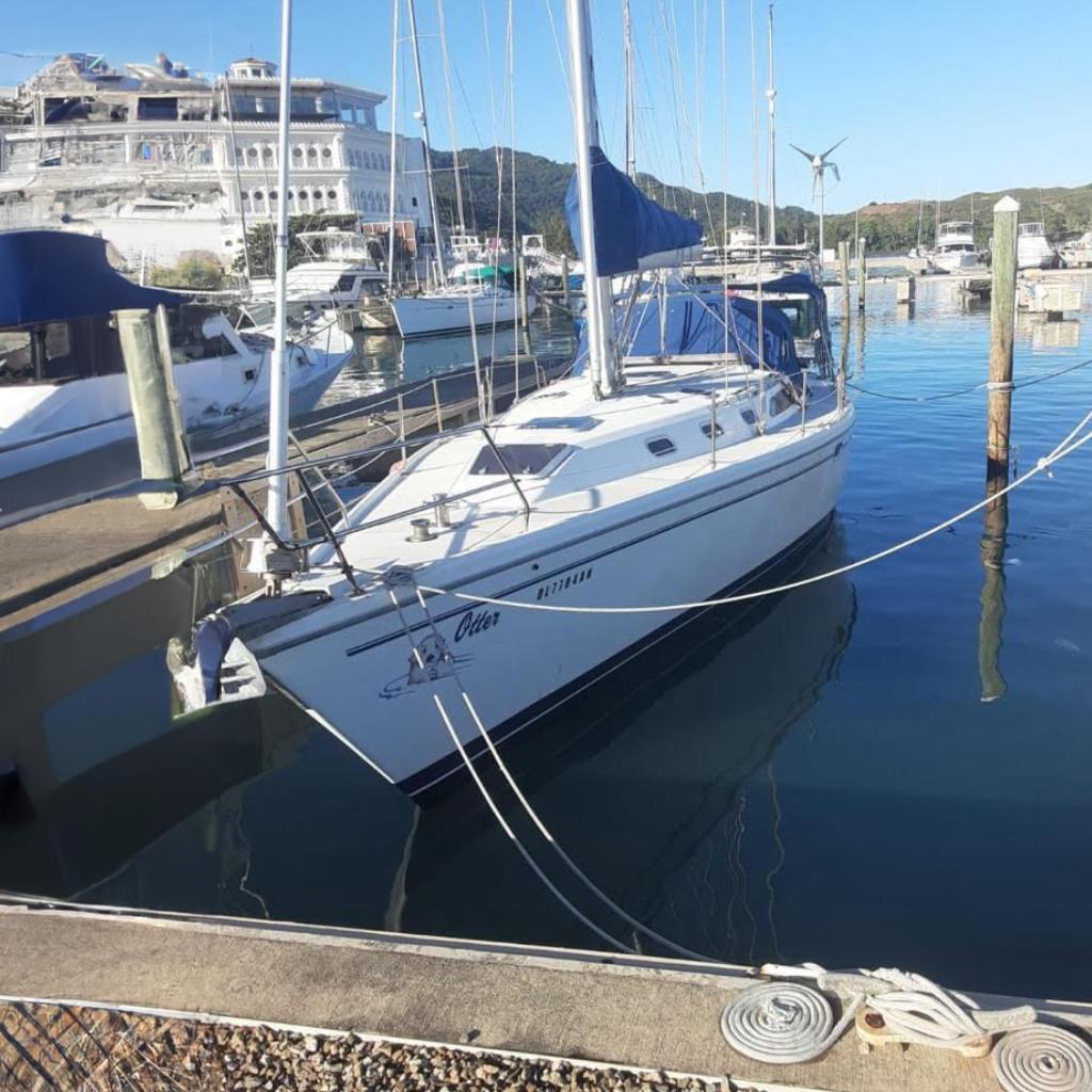 Catalina 42 MkII 2000 Catalina 42 Mk II sailboat docked in a marina.