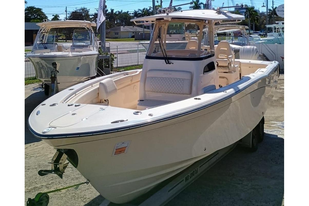 Grady-White Canyon 306 2024 Grady-White Canyon 306 boat displayed outdoors, showcasing sleek design and spacious deck.