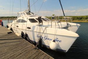Prout 38 Prout 38 catamaran docked, 2000 model, named "Salty Goose Two" with scenic background.