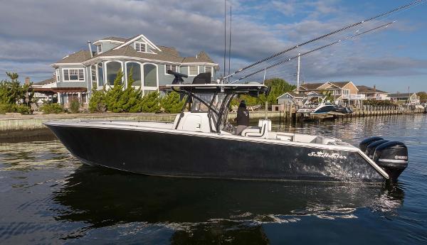 SeaHunter 35 Tournament 2016 SeaHunter 35 Tournament boat docked near waterfront homes.