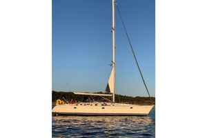 Jeanneau Sun Odyssey 45.2 2001 Jeanneau Sun Odyssey 45.2 sailboat on calm water at sunset.