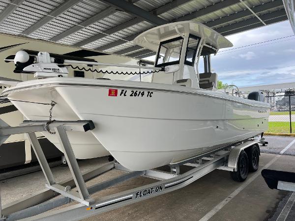 World Cat 235 CC 2022 World Cat 235 CC boat on trailer under shelter.