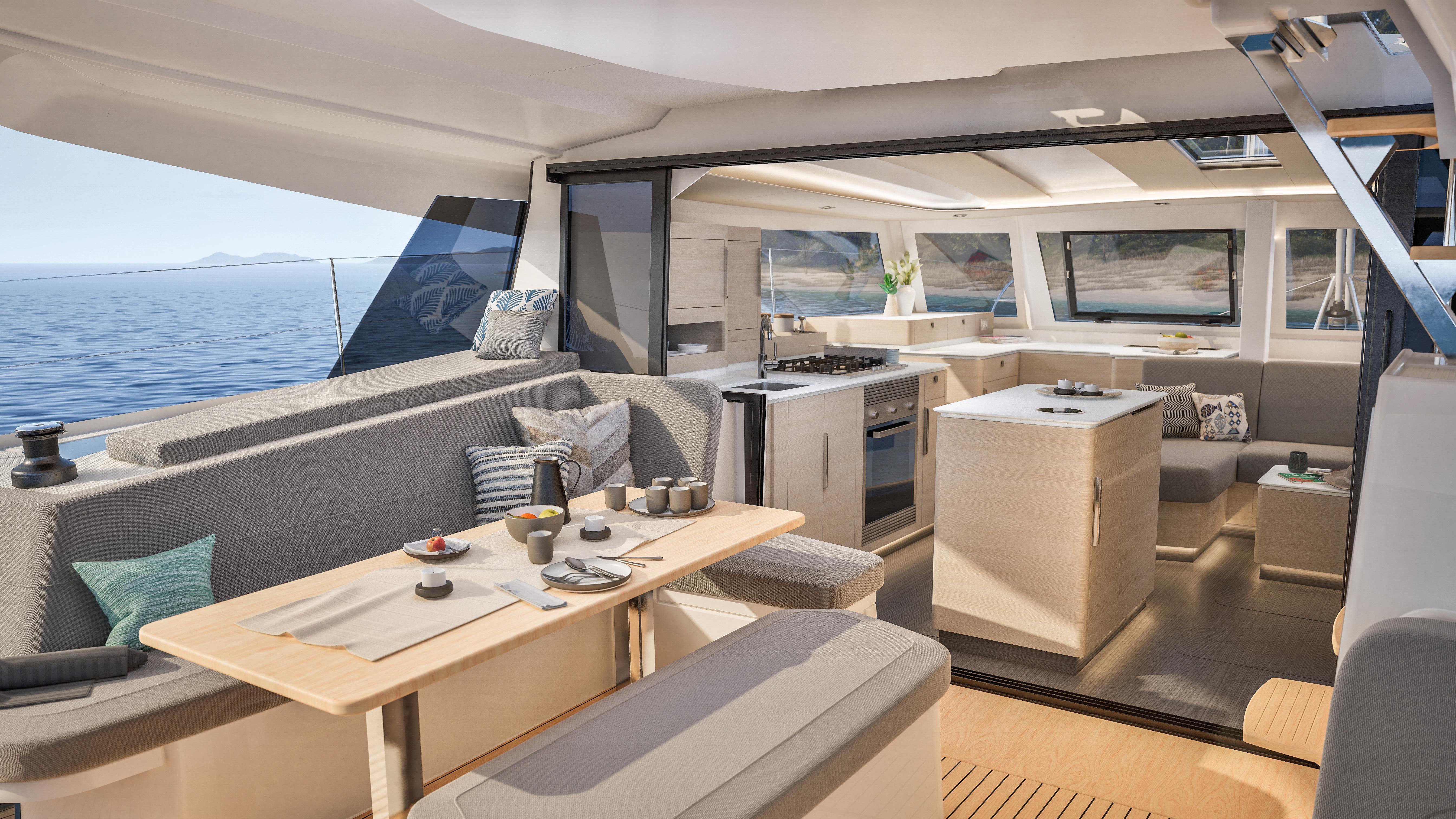 Fountaine Pajot 44 Luxurious interior of 2026 Fountaine Pajot 44 catamaran with modern kitchen and dining area.