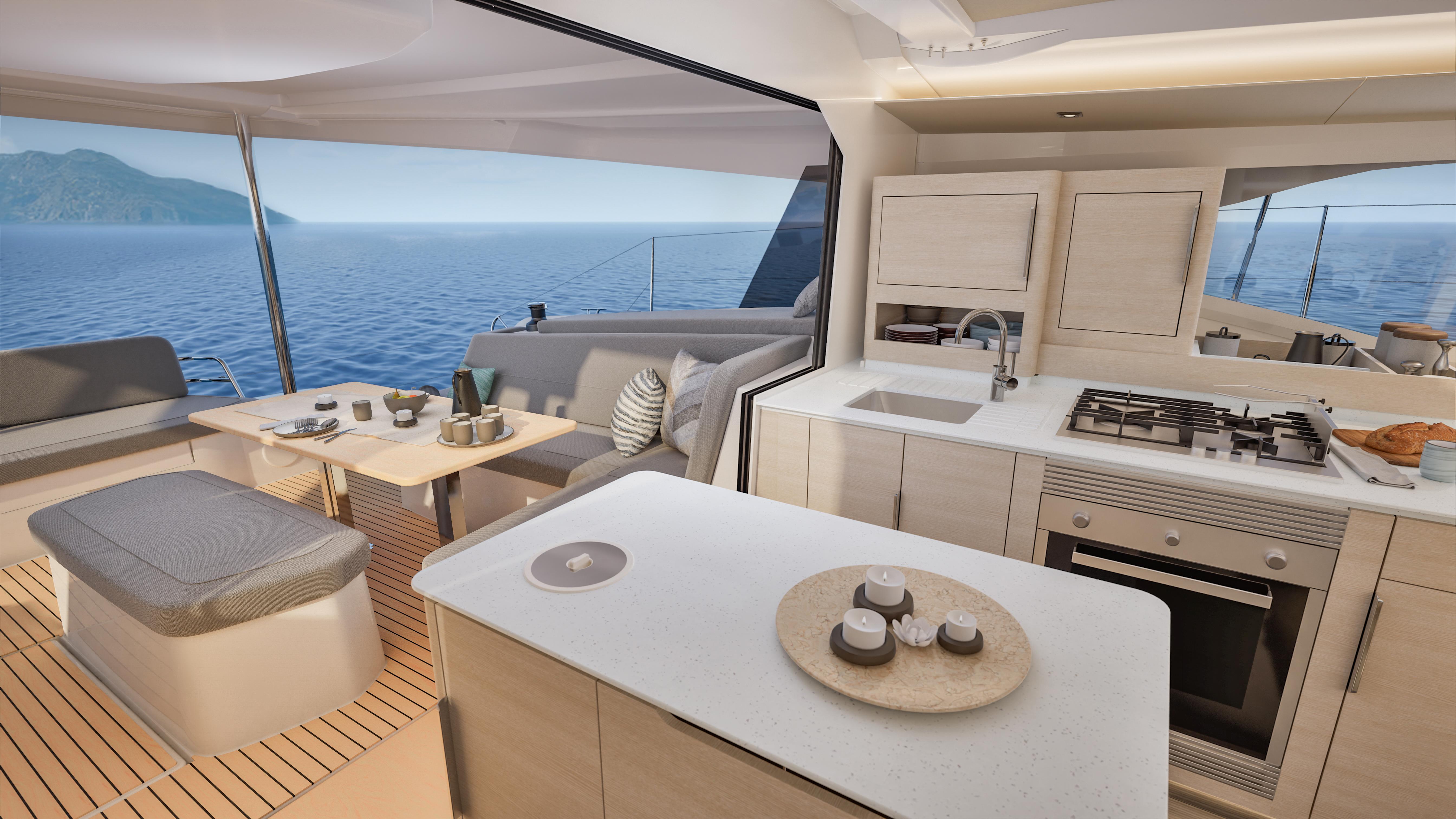 Fountaine Pajot 44 Luxurious interior of 2026 Fountaine Pajot 44 yacht with modern kitchen and ocean view.