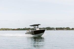 Sea Pro 245FLX Sandbar 2025 Sea Pro 245 FLX boat cruising on calm water.
