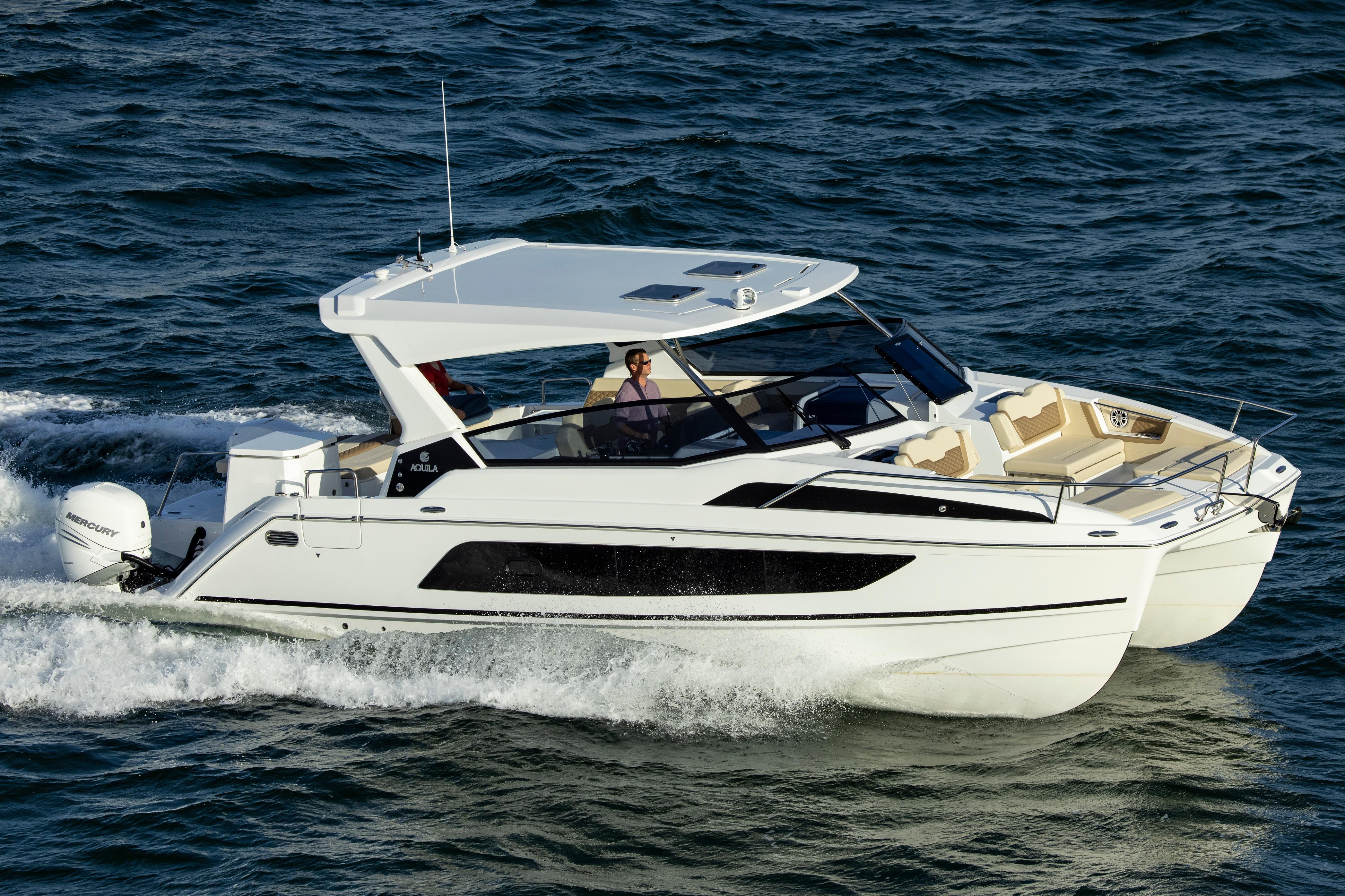 Aquila 36 2026 Aquila 36 catamaran cruising on open water, showcasing sleek design and modern features.