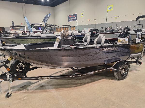Smoker Craft Excursion 166 SC 2025 Smoker Craft Excursion 166 SC boat displayed indoors on a trailer.