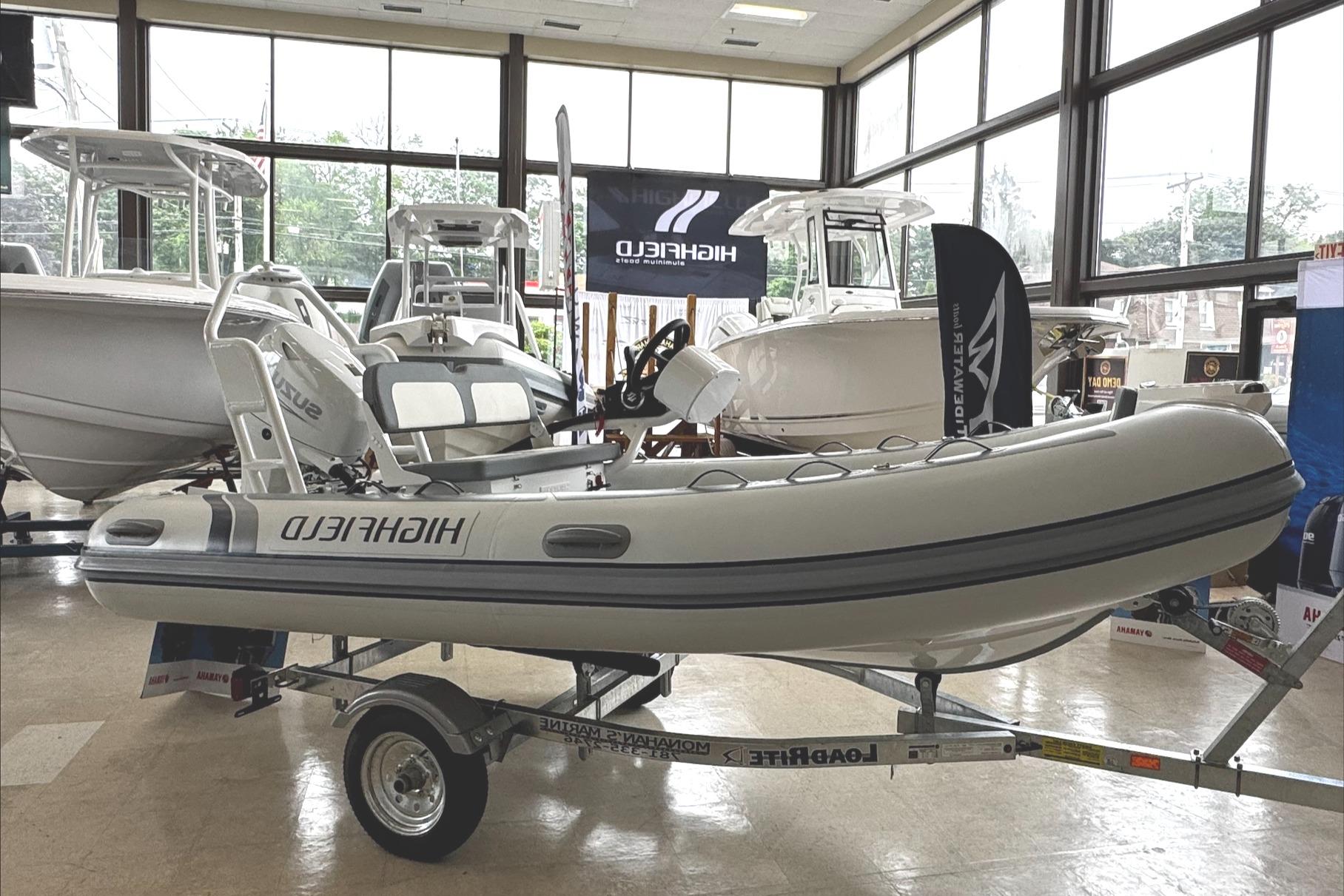 Highfield CL400 2025 Highfield CL400 inflatable boat displayed indoors on a trailer.