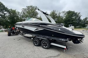 Crownline Eclipse E255 2020 Crownline Eclipse E255 boat on trailer, parked outdoors.